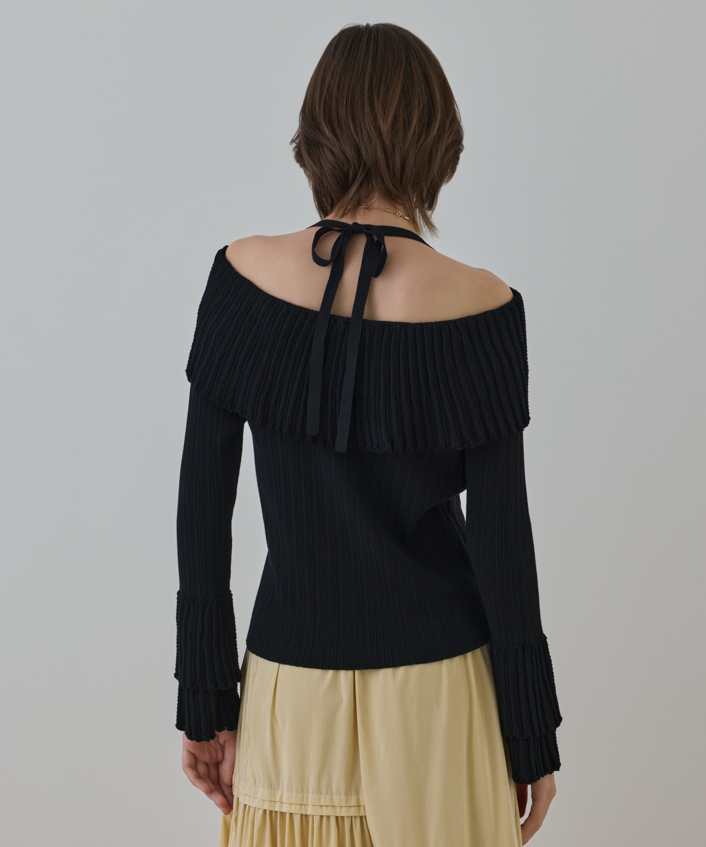 アイレットフレアニットトップ