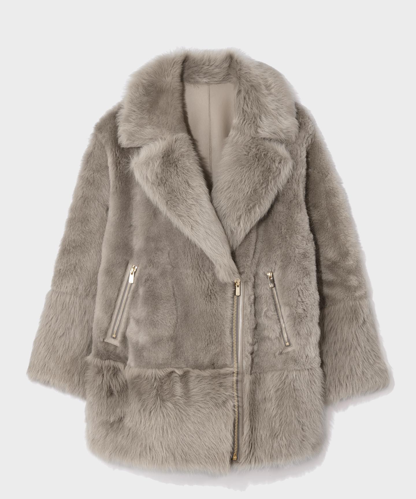 ムートンポンチョコート