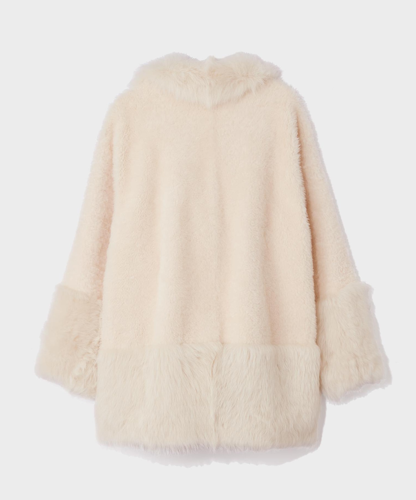 ムートンポンチョコート